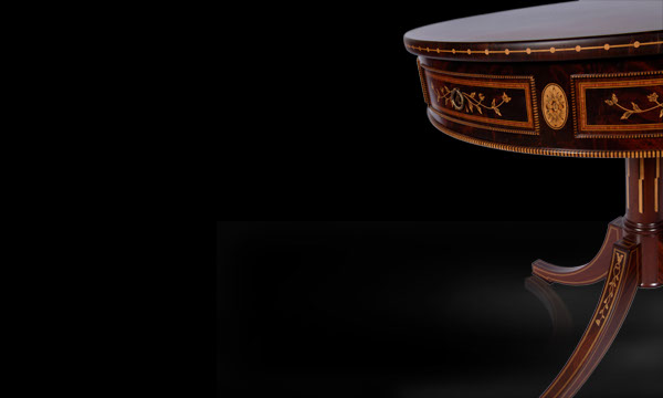 Detail of marquetry artwork of rotative dark classic round table